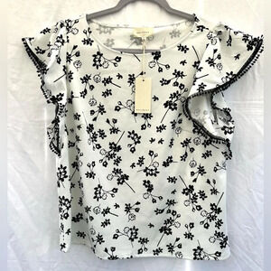 MELLODAY blouse size L, white w/ black flowers, ruffled short sleeves, brand new